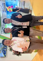 To the right, Liu Jing Le from JinTaiHua Agriculture Products.